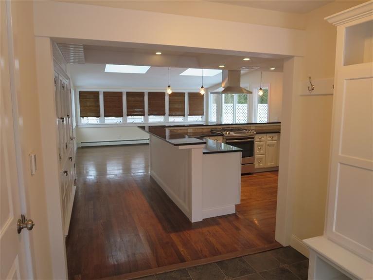 138 South Main Street Centerville, MA 02632 - Photo 7 of 35 a view of kitchen with stainless steel appliances granite countertop a stove and a sink