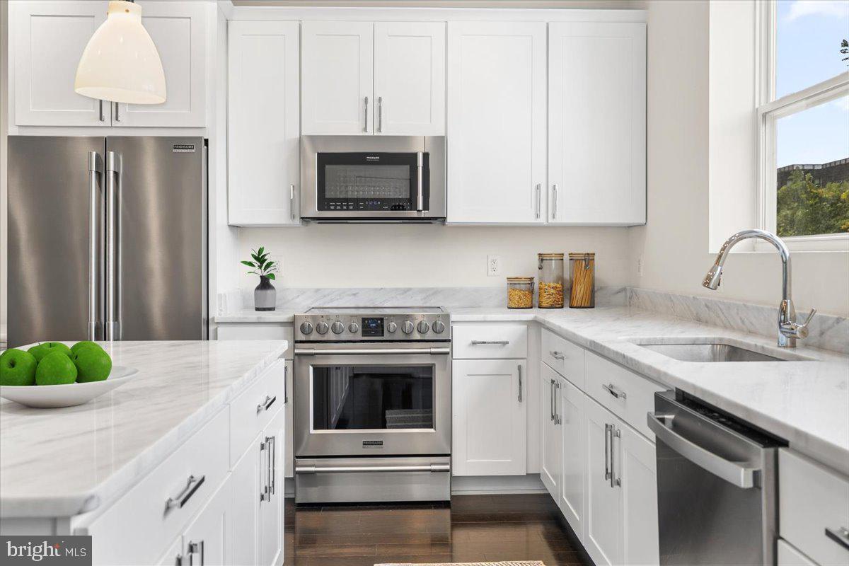 3312 9th Street Northeast Washington, DC 20017 - Photo 3 of 32 Open kitchen w/window above the sink.