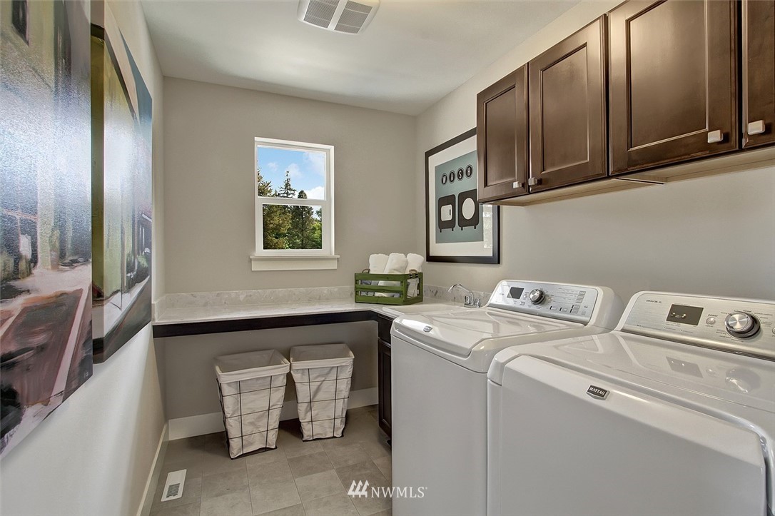 22317 44th Drive Southeast Bothell, WA 98021 - Photo 12 of 14 a utility room with dryer and washer