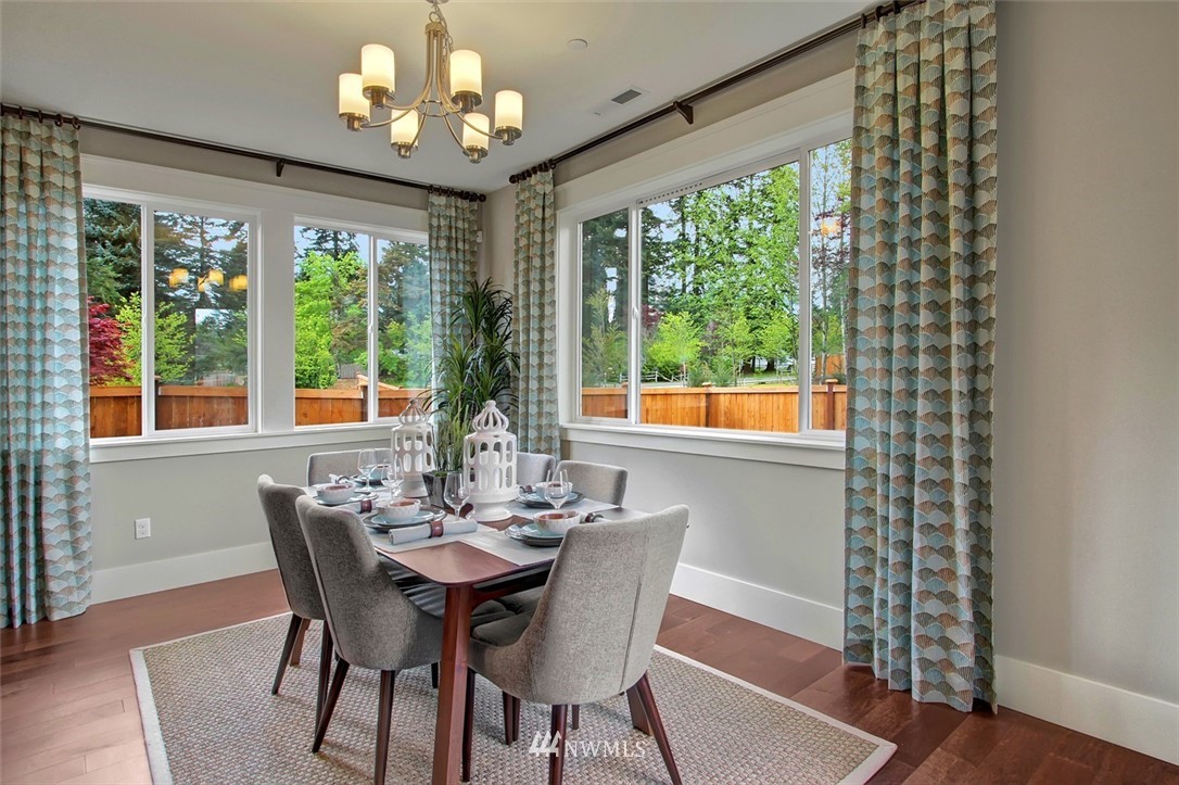22317 44th Drive Southeast Bothell, WA 98021 - Photo 3 of 14 a view of a dining room with furniture window and outside view