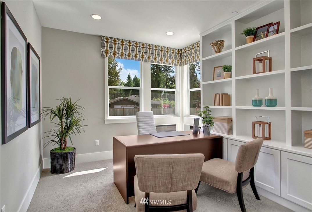 22317 44th Drive Southeast Bothell, WA 98021 - Photo 4 of 14 a dining room with furniture window and wooden floor