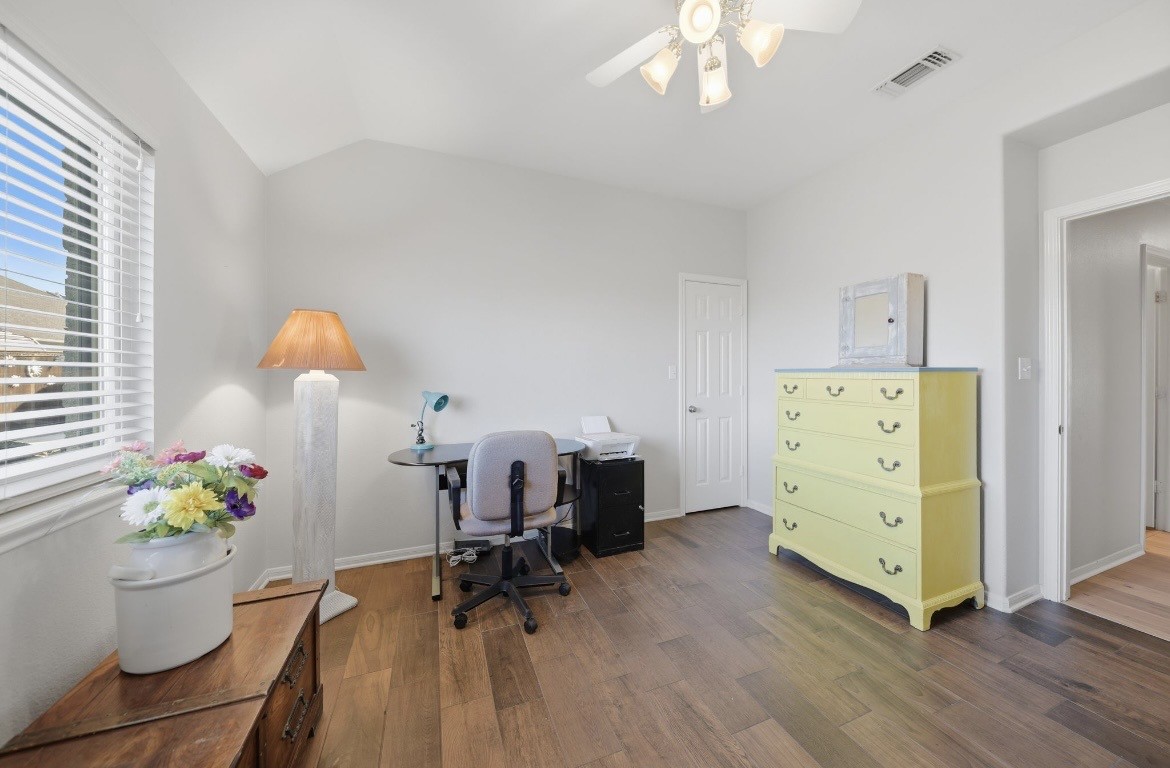 306 Matula Avenue Schulenburg, TX 78956 - Photo 11 of 21 a view of a workspace with furniture and a window