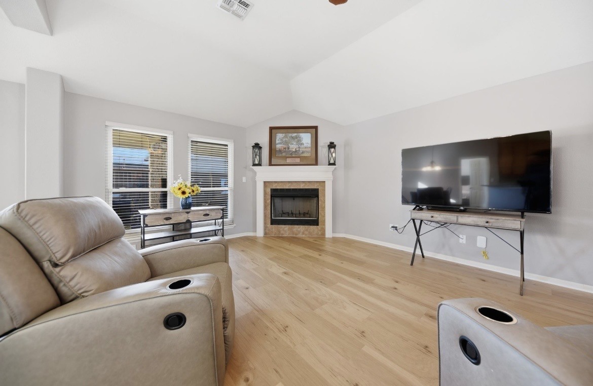 306 Matula Avenue Schulenburg, TX 78956 - Photo 7 of 21 a living room with furniture and a flat screen tv