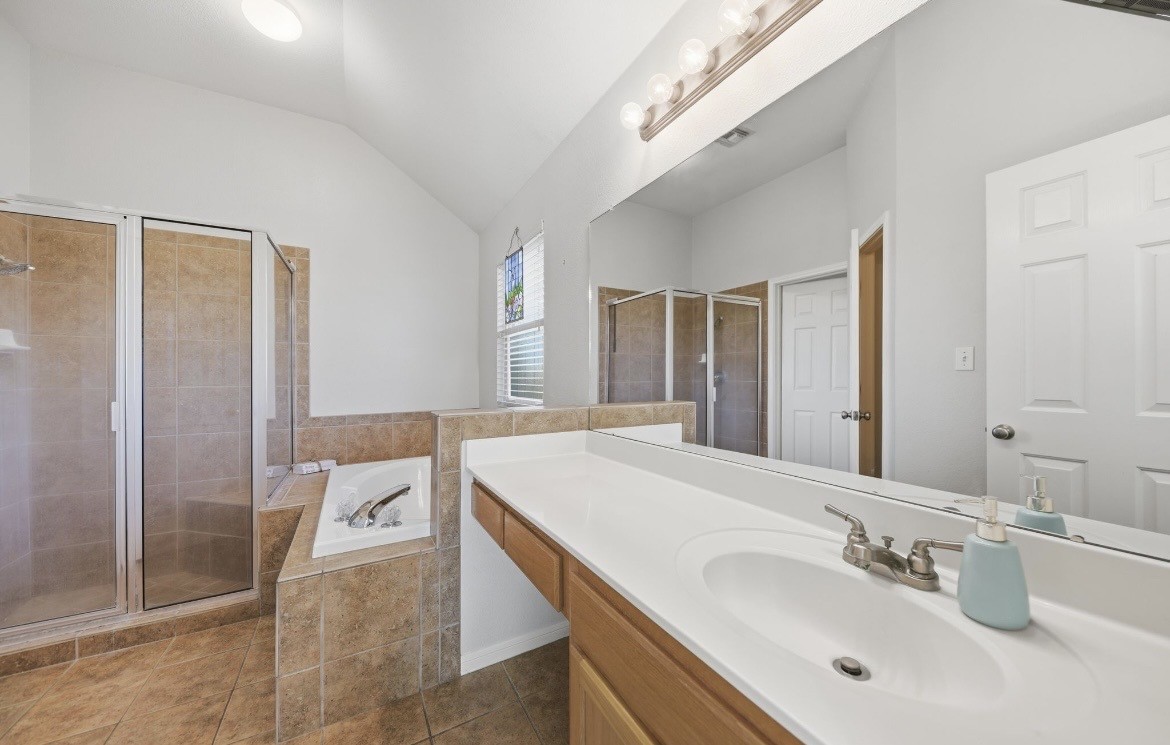 306 Matula Avenue Schulenburg, TX 78956 - Photo 10 of 21 a bathroom with a sink and a mirror