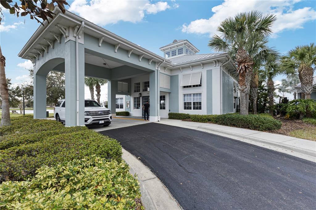 506 Rainbow Springs Loop Groveland, FL 34736 - Photo 23 of 30 a view of a building with a outdoor space