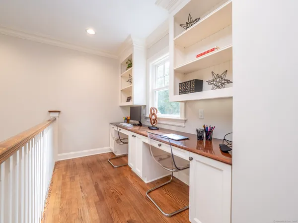 a kitchen with a sink and a stove top oven
