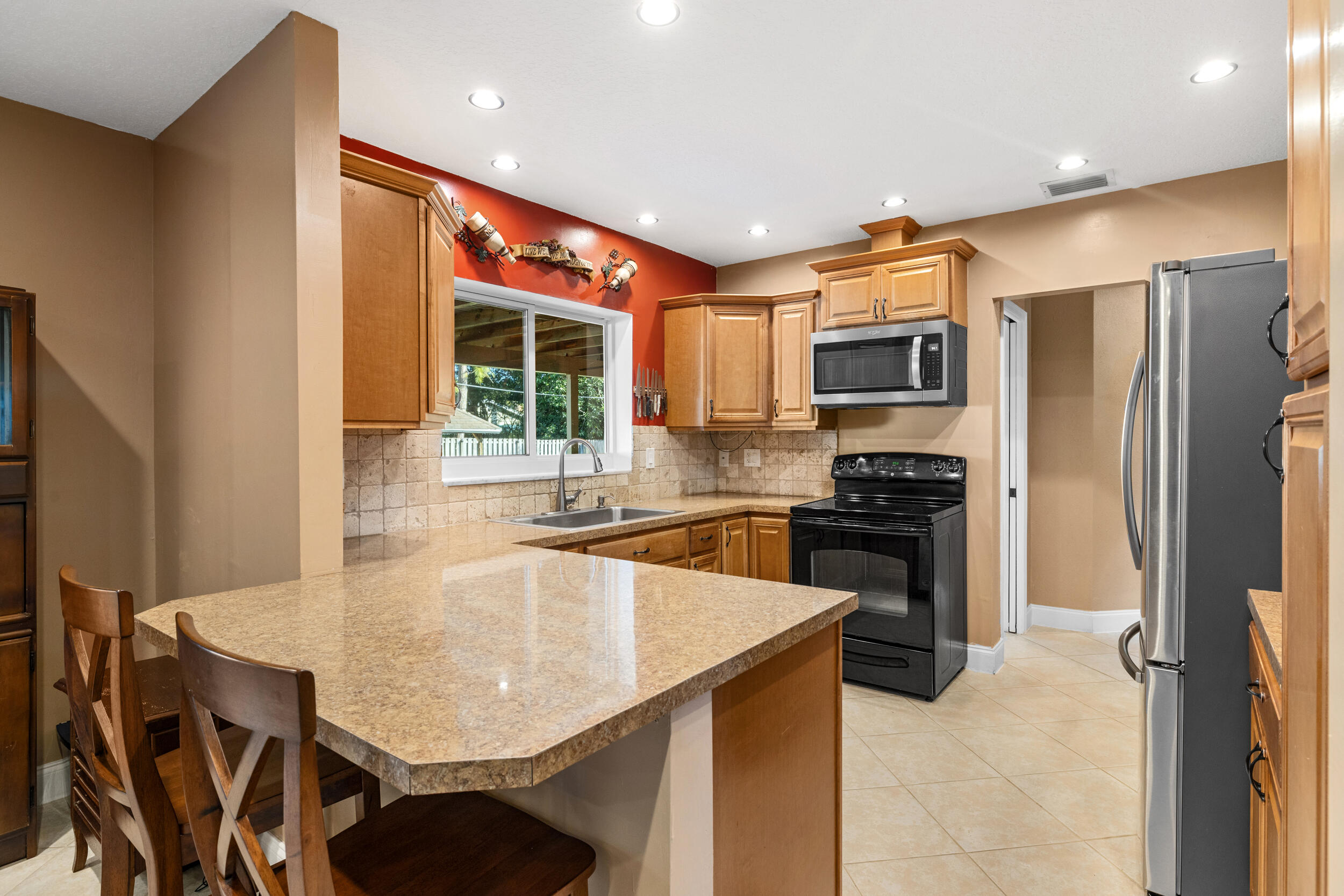5051 Van Buren Road Delray Beach, FL 33484 - Photo 16 of 55 Kitchen W/ Bar Seating