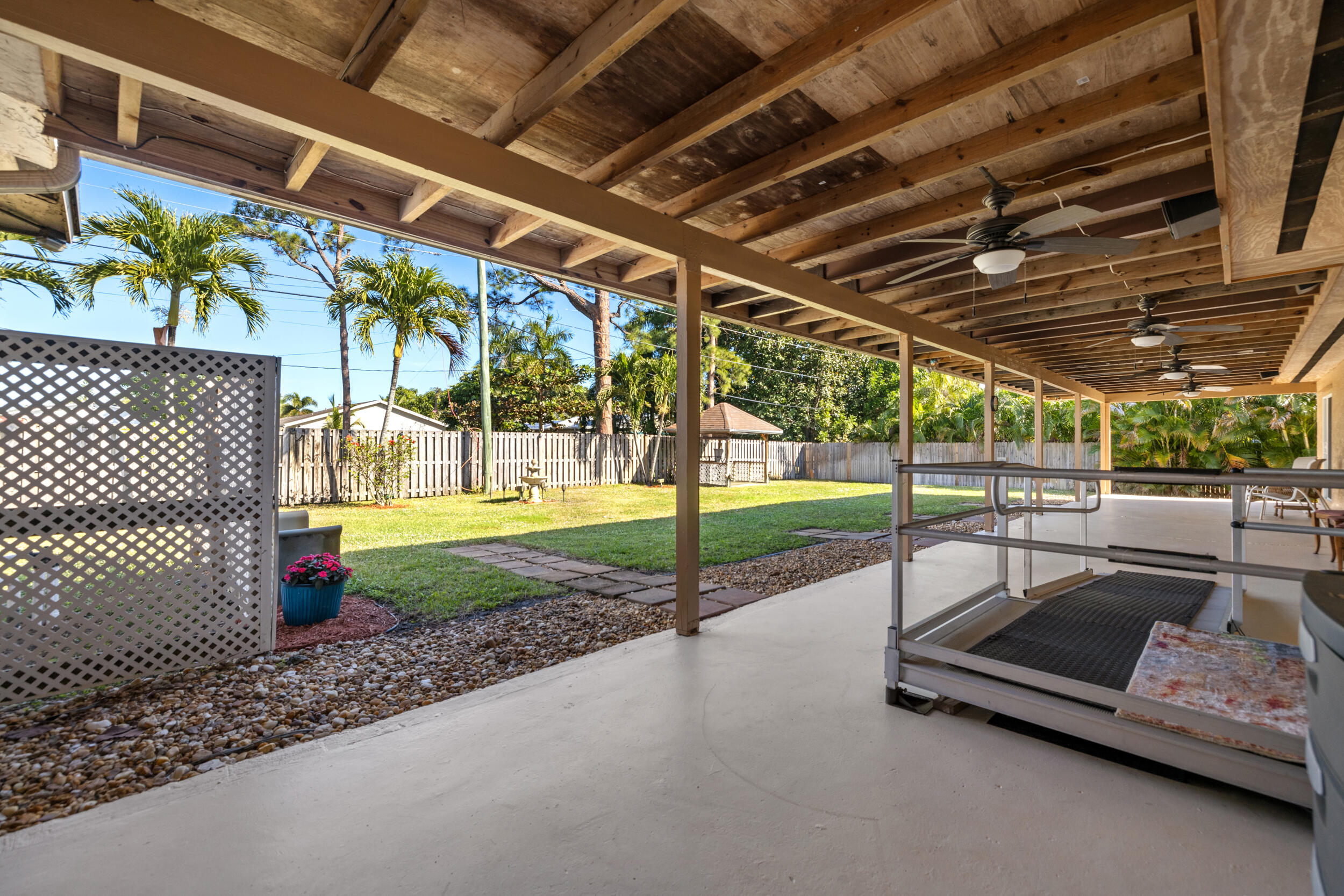 5051 Van Buren Road Delray Beach, FL 33484 - Photo 38 of 55 Enormous 700+ sqft Covered Patio