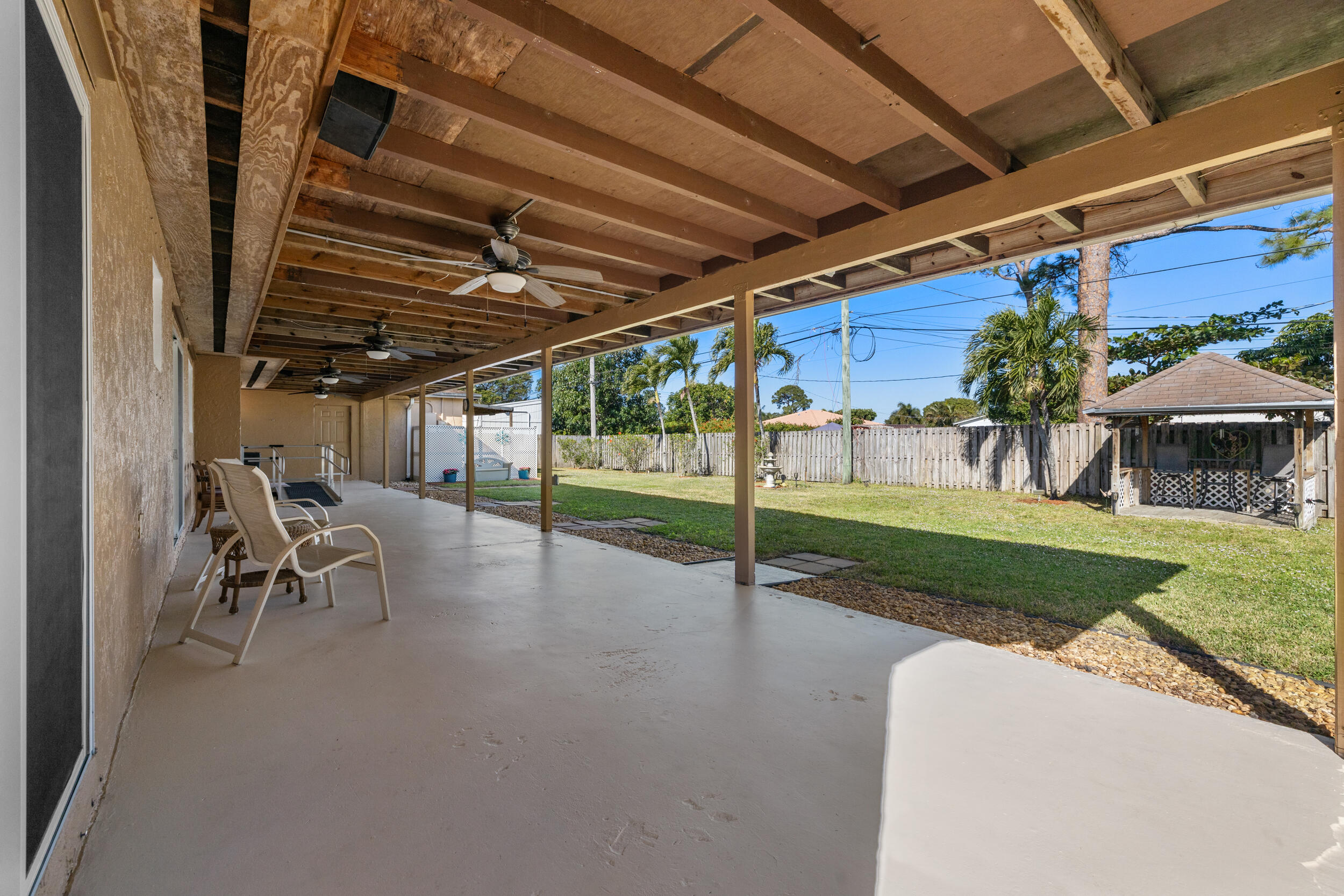 5051 Van Buren Road Delray Beach, FL 33484 - Photo 39 of 55 Enormous 700+ sqft Covered Patio