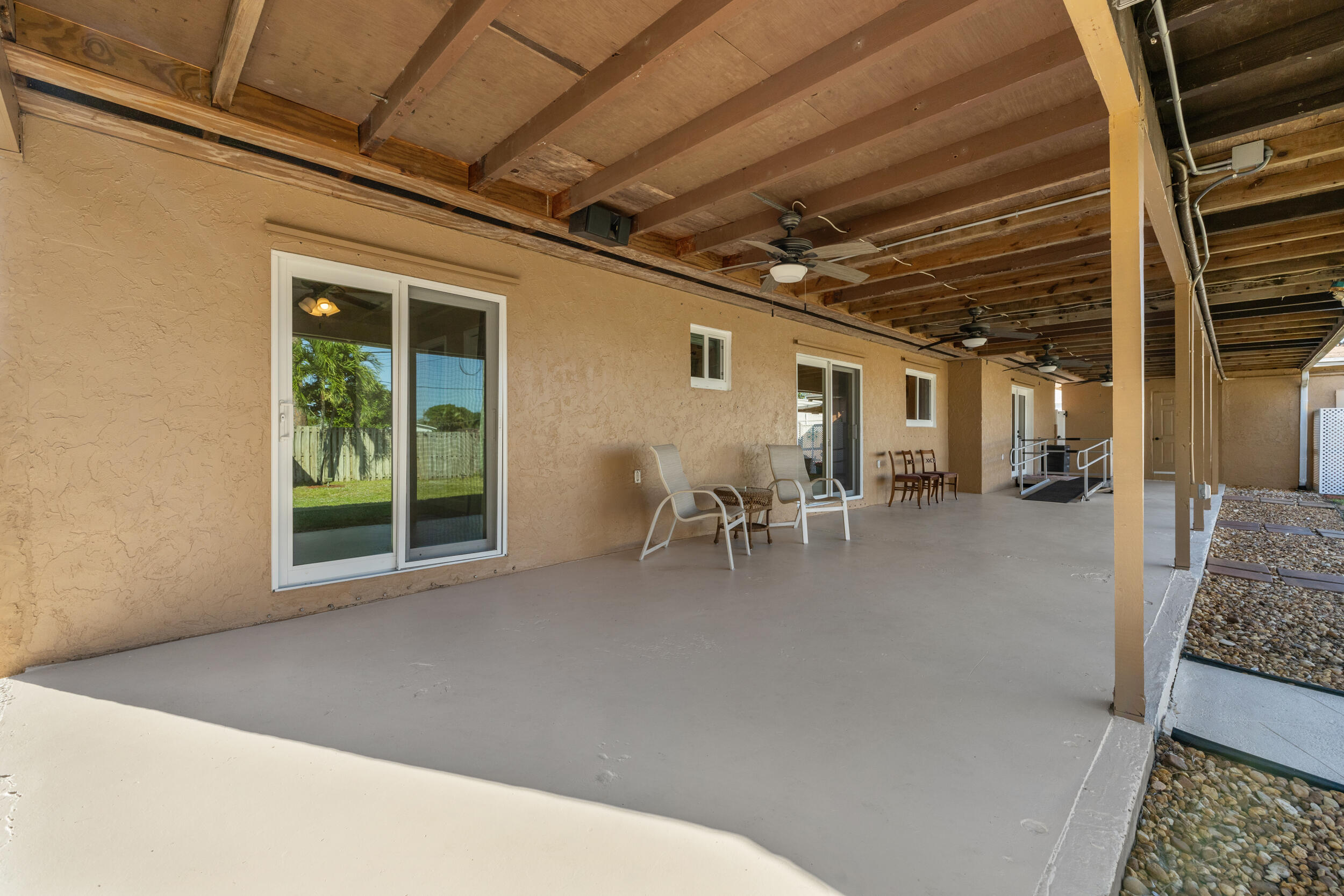 5051 Van Buren Road Delray Beach, FL 33484 - Photo 40 of 55 Enormous 700+ sqft Covered Patio
