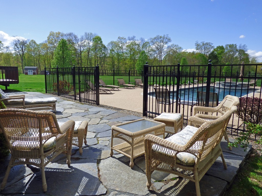 3 Dewolf Road Montague, MA 01351 - Photo 3 of 30 a view of a patio with iron fence