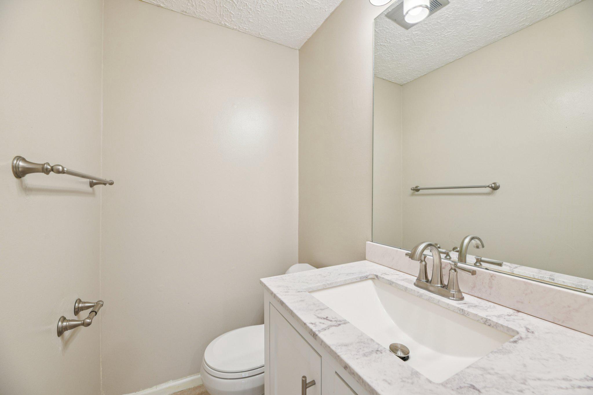 418 Legato Terrace Silver Spring, MD 20901 - Photo 8 of 23 Powder room on main level