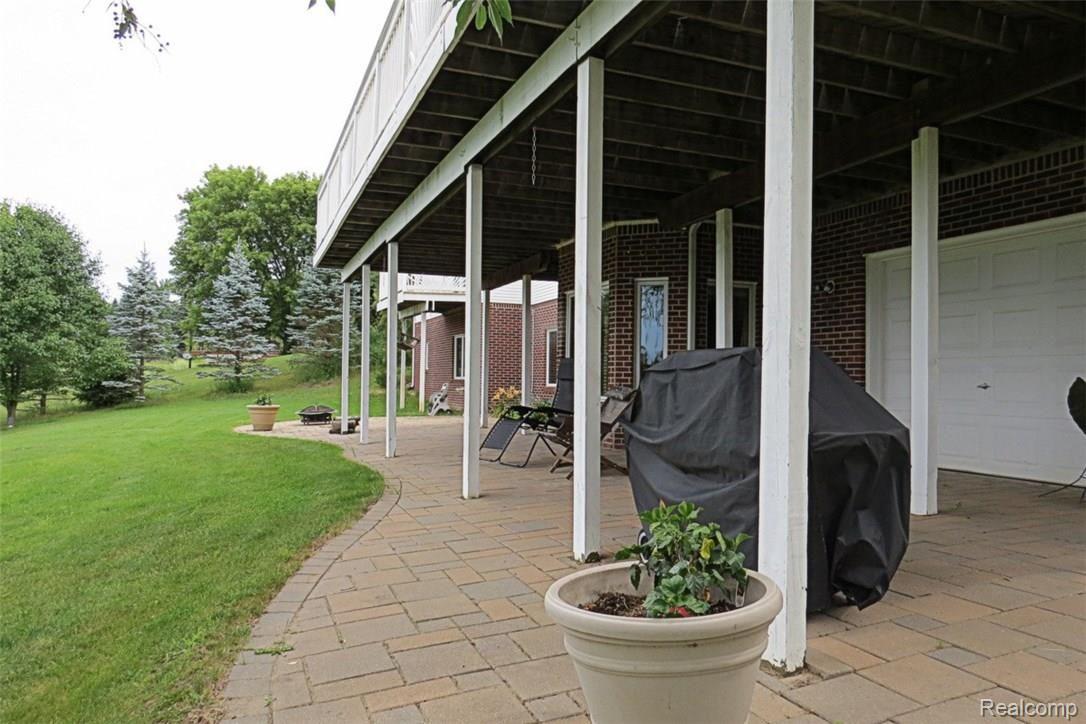 942 South Kern Road Fowlerville, MI 48836 - Photo 60 of 77 Notice the utility garage for your landscaping equipment or extra toys or workshop!