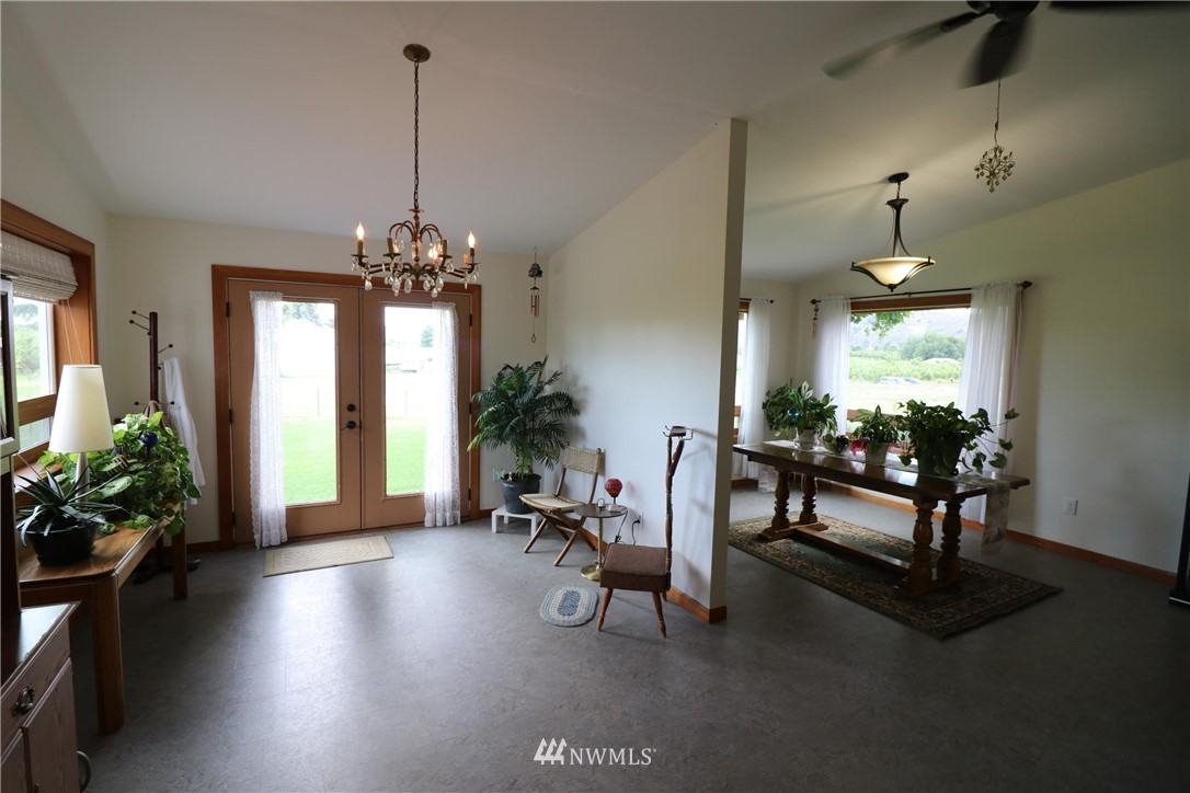 39 Dixon Road Omak, WA 98841 - Photo 19 of 38 a lobby with furniture and a chandelier