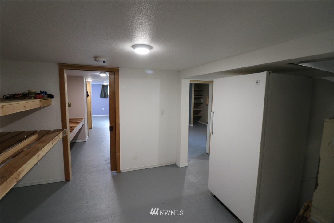 39 Dixon Road Omak, WA 98841 - Photo 35 of 38 a view of hallway with stairs and a closet