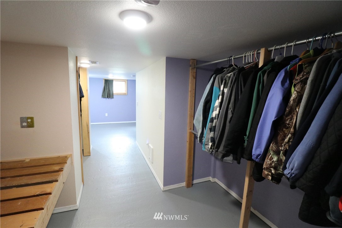 39 Dixon Road Omak, WA 98841 - Photo 36 of 38 a view of walk in closet with clothes and shoes