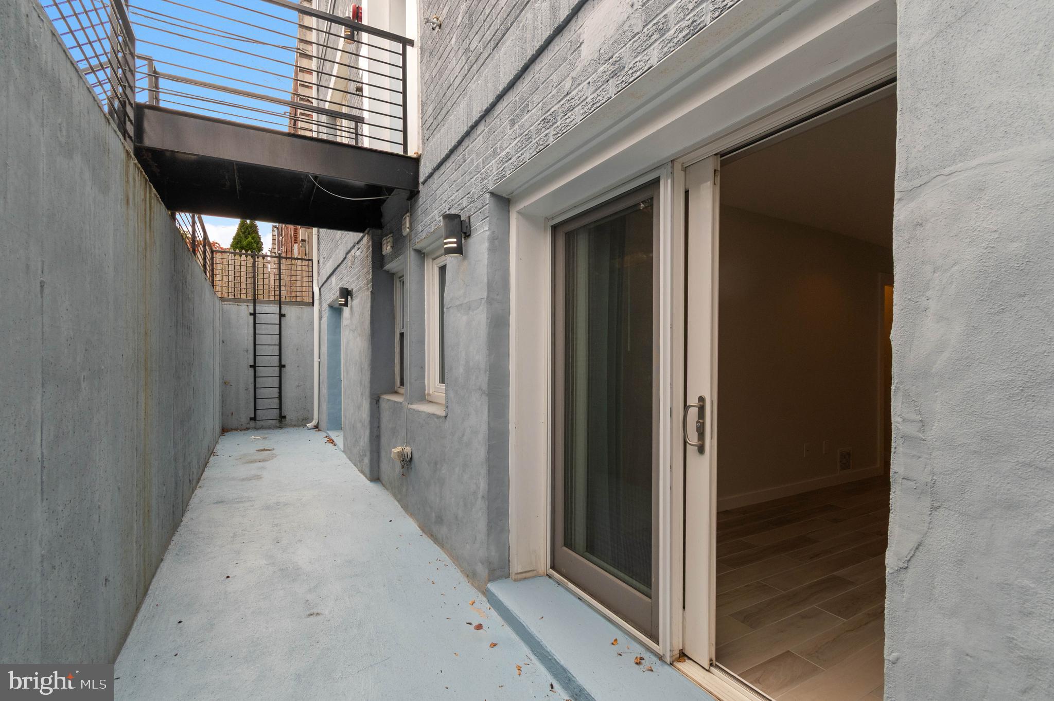 5012 2nd Street Northwest, Unit 2 Washington, DC 20011 - Photo 16 of 30 a view of a brick house with a large door