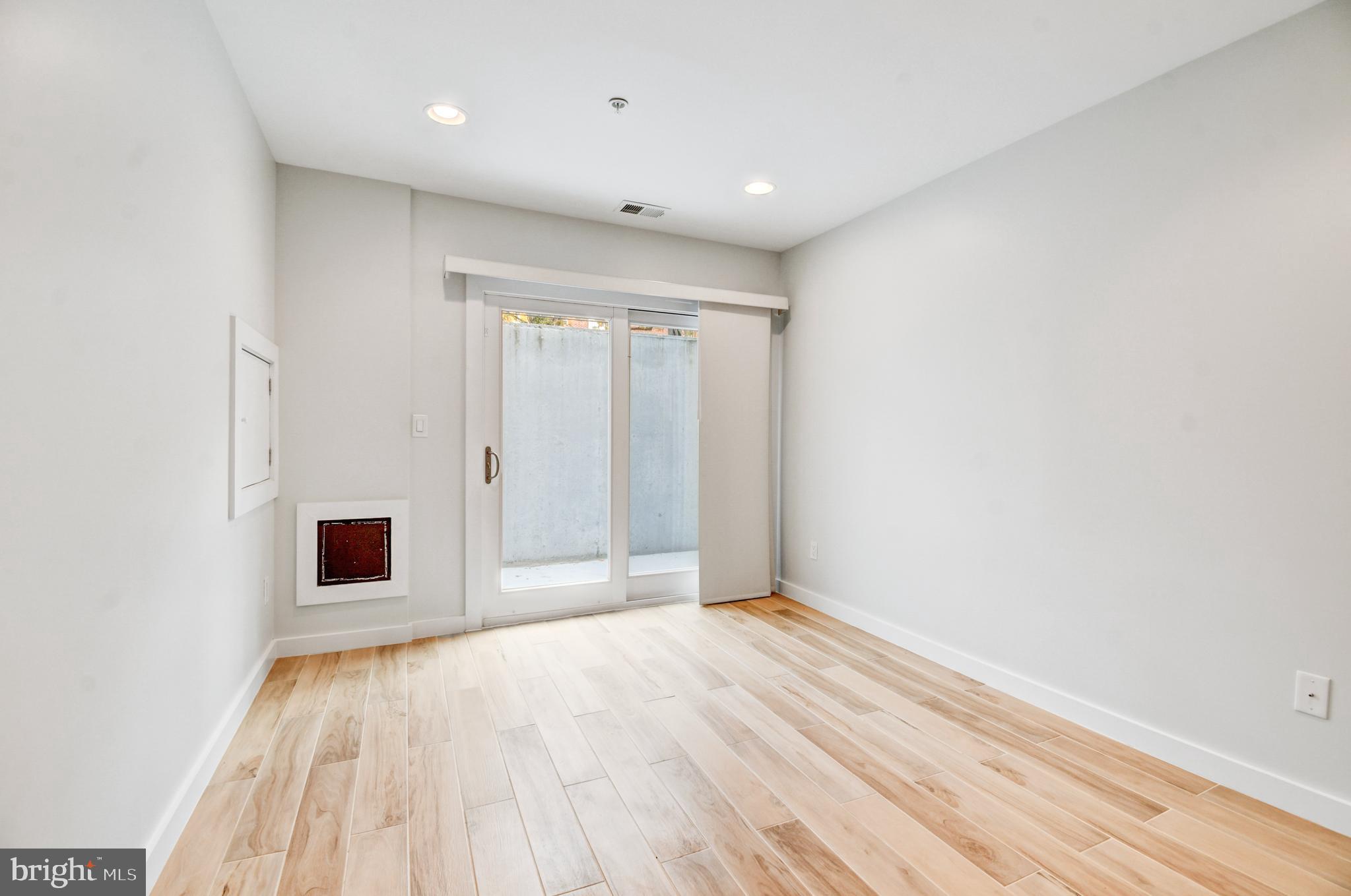 5012 2nd Street Northwest, Unit 2 Washington, DC 20011 - Photo 20 of 30 a view of a room with wooden floor