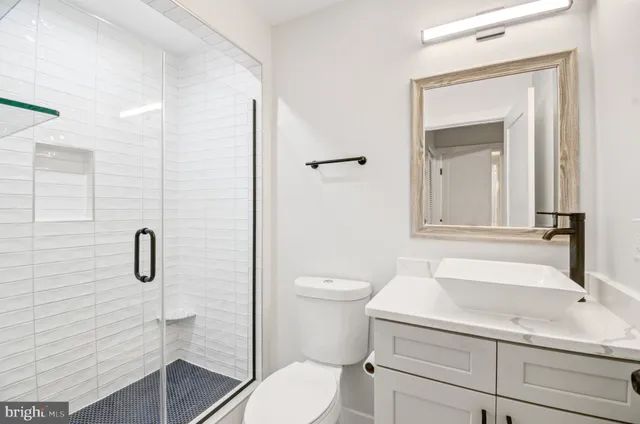 a kitchen with a sink and a stove