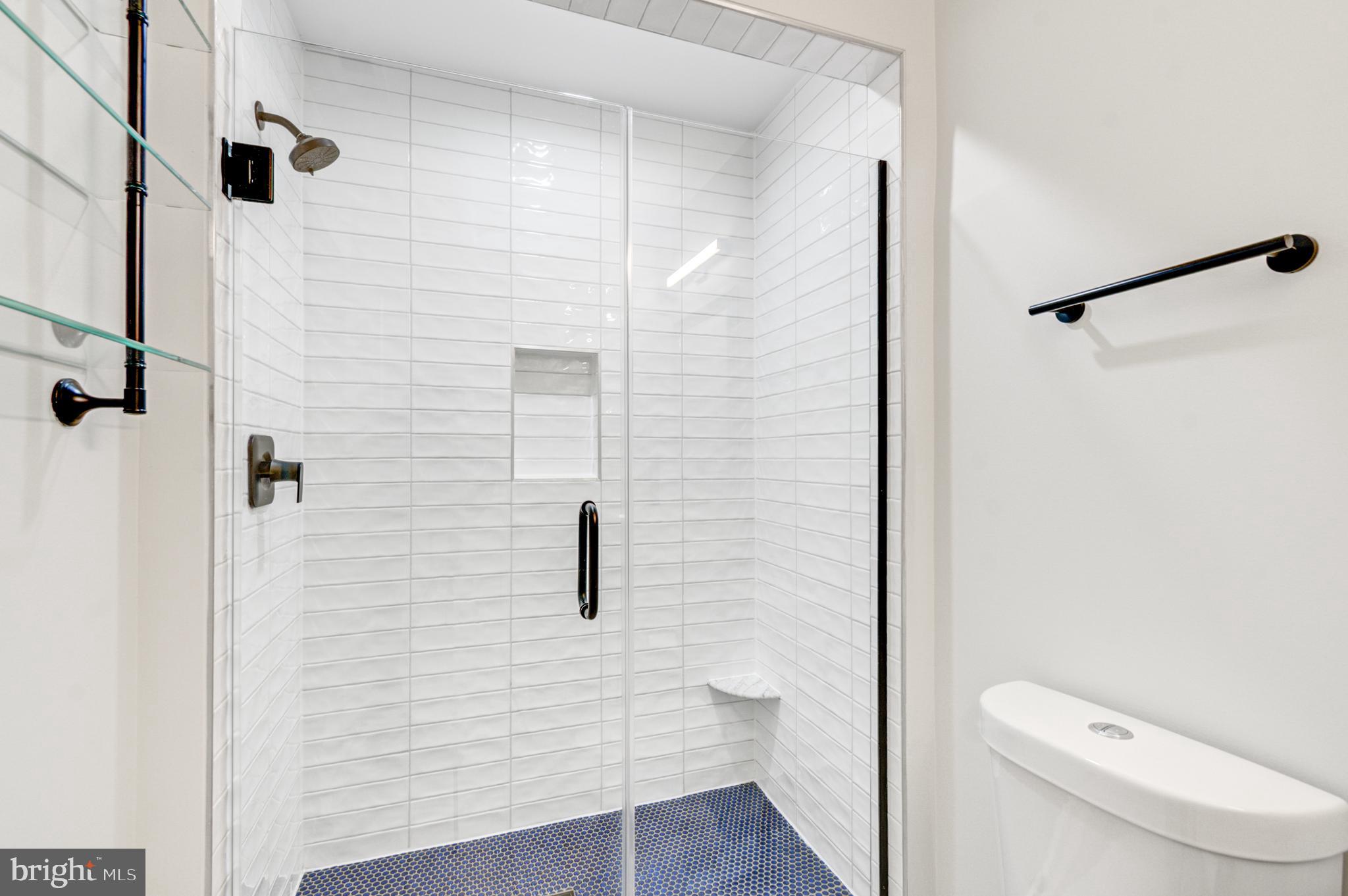5012 2nd Street Northwest, Unit 2 Washington, DC 20011 - Photo 22 of 30 a bathroom with a toilet and a shower