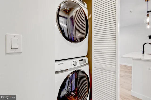 a view of a brick building next to a yard