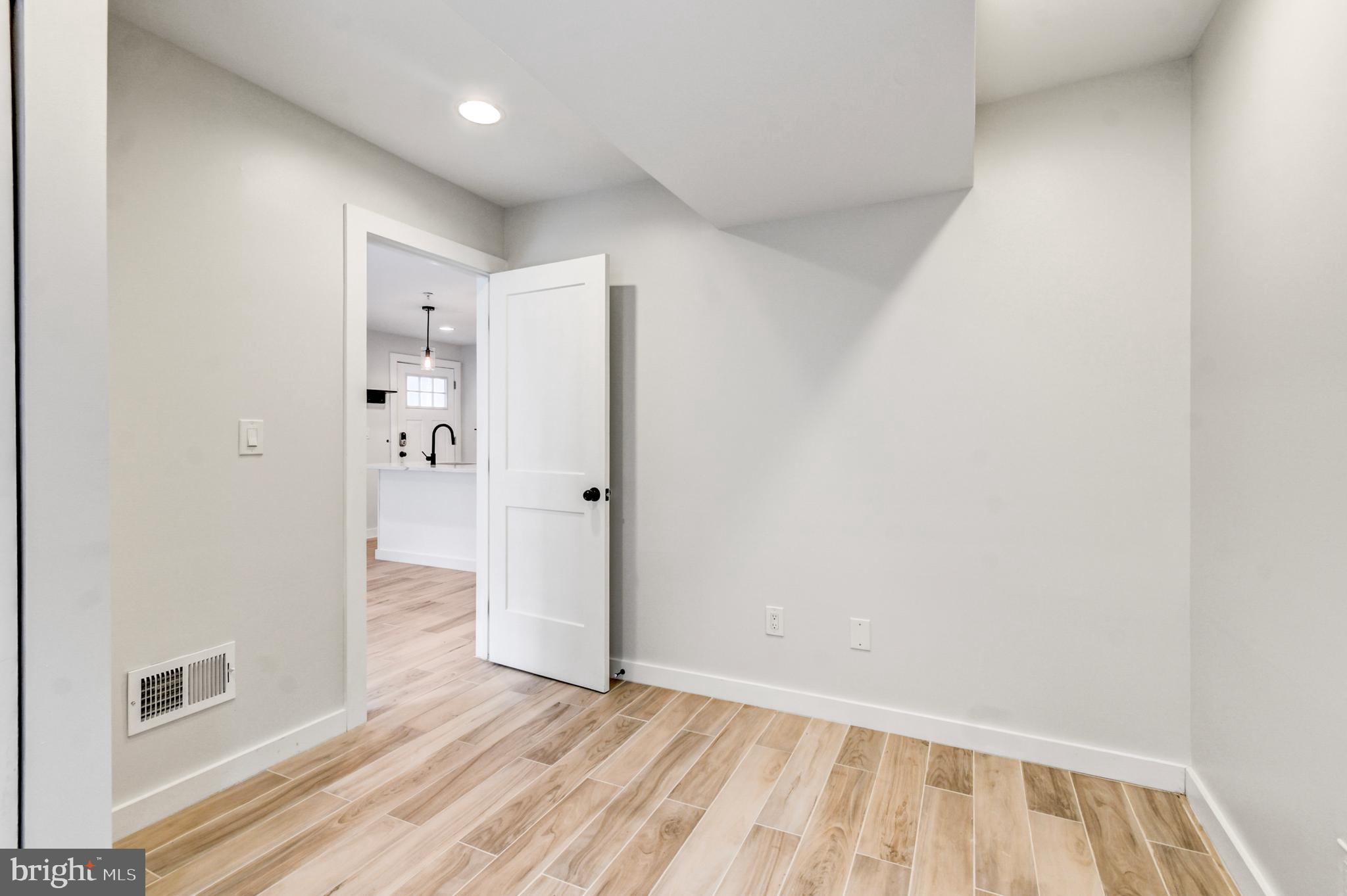 5012 2nd Street Northwest, Unit 2 Washington, DC 20011 - Photo 25 of 30 a view of empty room with wooden floor