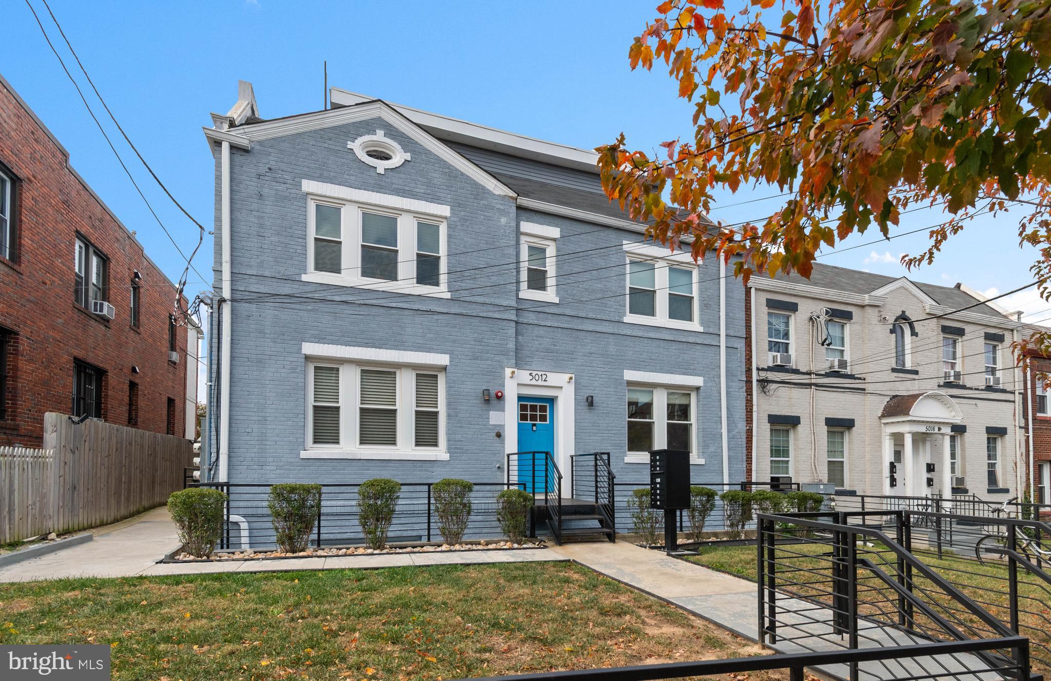 5012 2nd Street Northwest, Unit 2 Washington, DC 20011 - Photo 5 of 30 a front view of a house with a yard
