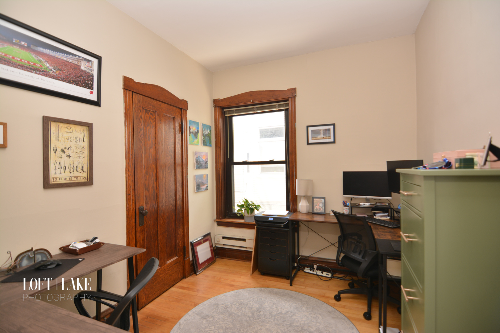 1611 West Grace Street, Unit 1 Chicago, IL 60613 - Photo 6 of 9 a view of a workspace with furniture and a window