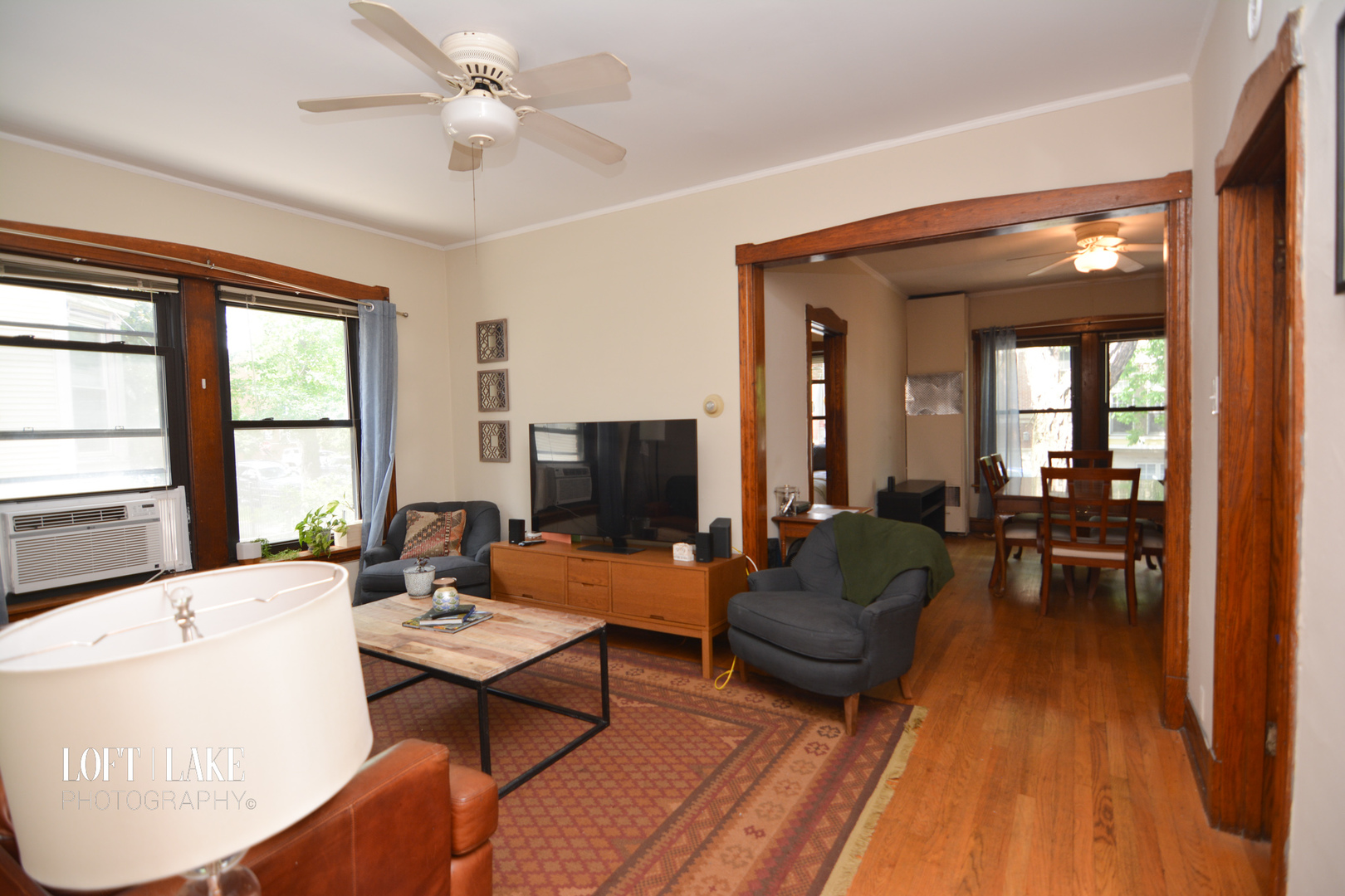 1611 West Grace Street, Unit 1 Chicago, IL 60613 - Photo 9 of 9 a living room with furniture and a fireplace