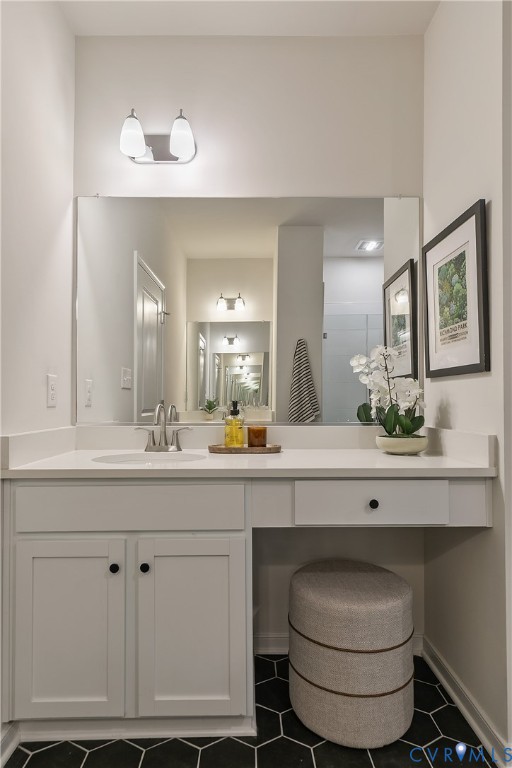1459 Overbrook Road Richmond, VA 23220 - Photo 25 of 39 a bathroom with a sink and a mirror