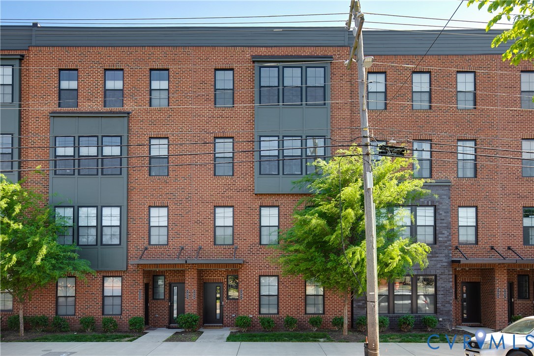 1459 Overbrook Road Richmond, VA 23220 - Photo 3 of 39 a front view of a multi story building with yard