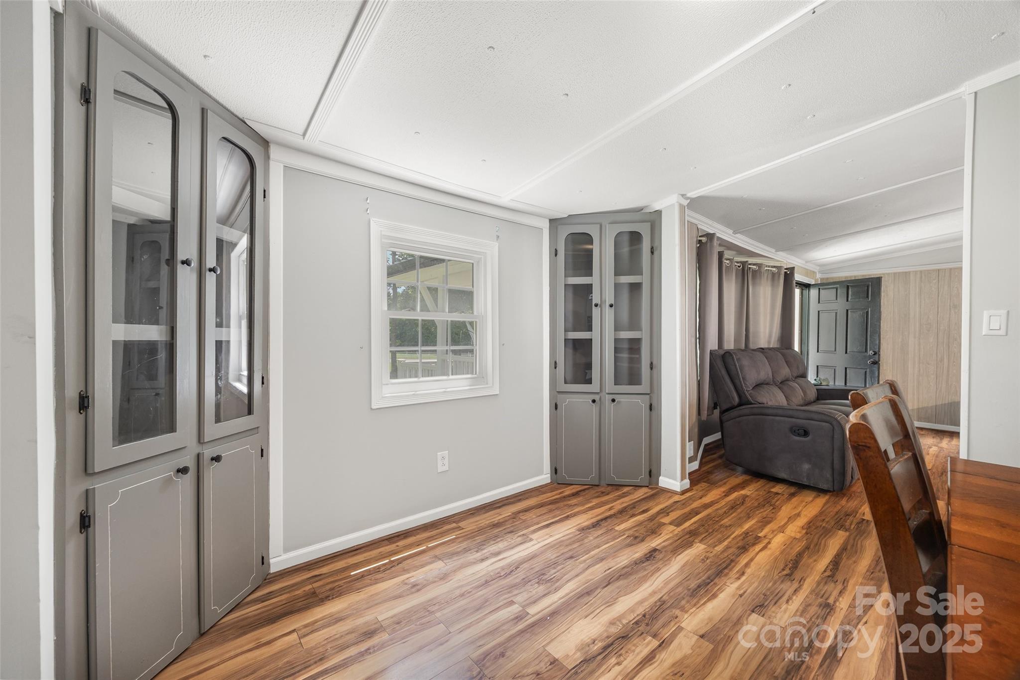2784 Billy Wilson Road, Unit 15 Rock Hill, SC 29732 - Photo 11 of 33 a bedroom with a bed and wooden floor