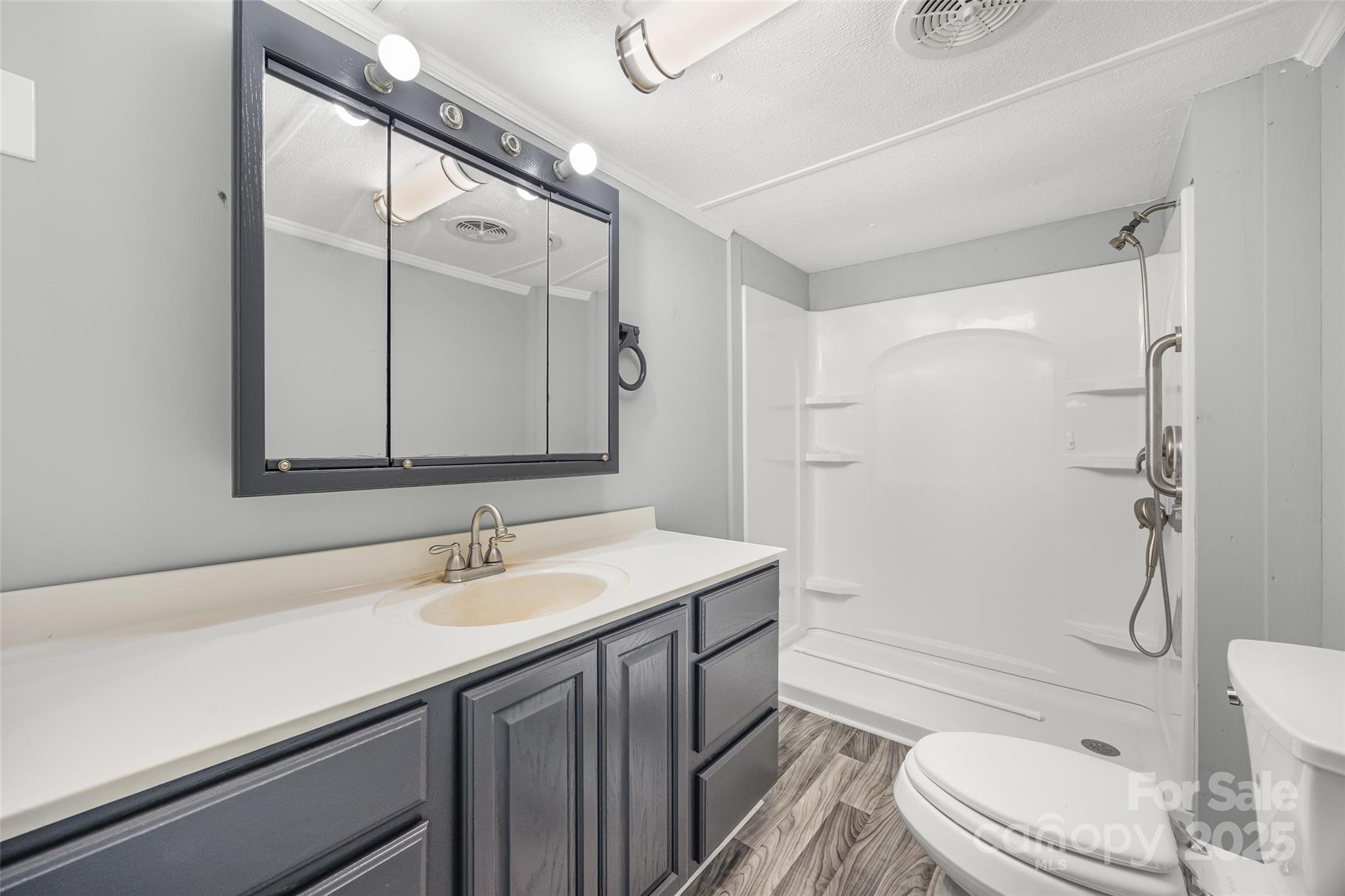 2784 Billy Wilson Road, Unit 15 Rock Hill, SC 29732 - Photo 24 of 33 a bathroom with a sink a toilet and shower