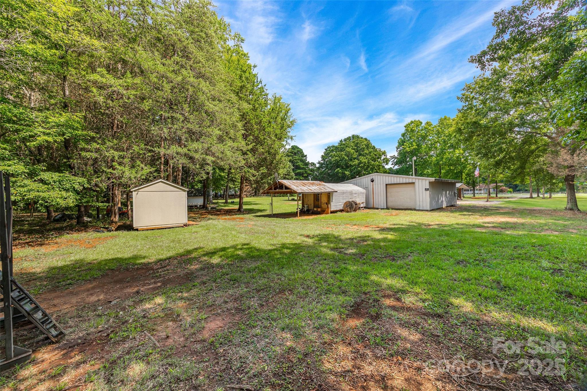 2784 Billy Wilson Road, Unit 15 Rock Hill, SC 29732 - Photo 29 of 33 a front view of a house with a garden and outdoor seating