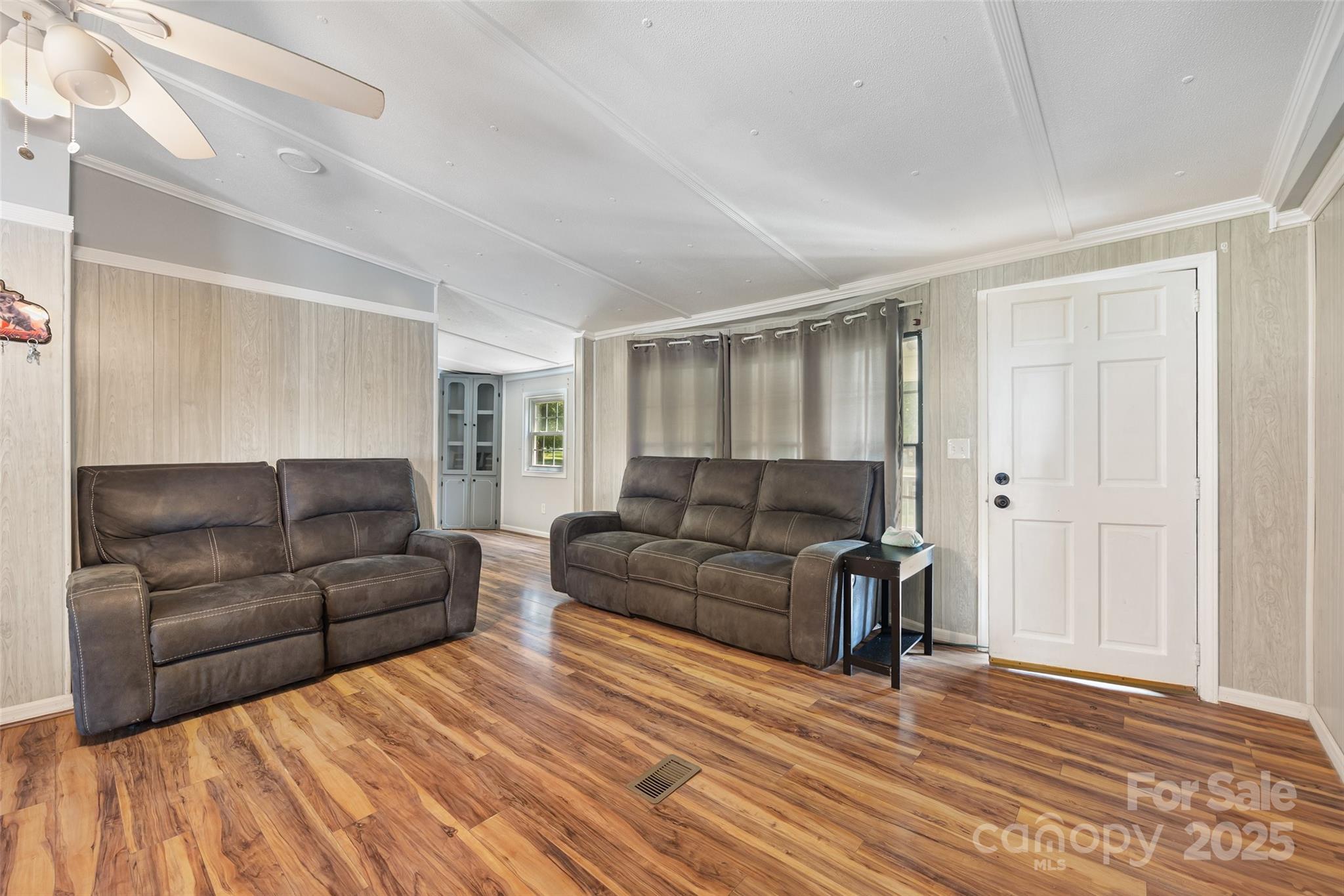 2784 Billy Wilson Road, Unit 15 Rock Hill, SC 29732 - Photo 6 of 33 a living room with a couch and a wooden floor