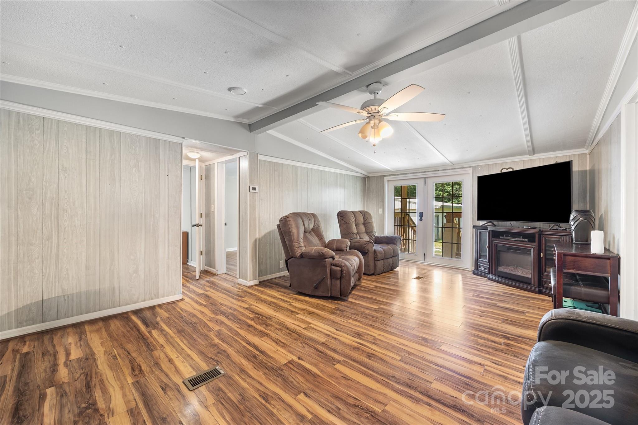 2784 Billy Wilson Road, Unit 15 Rock Hill, SC 29732 - Photo 7 of 33 a living room with furniture and a flat screen tv
