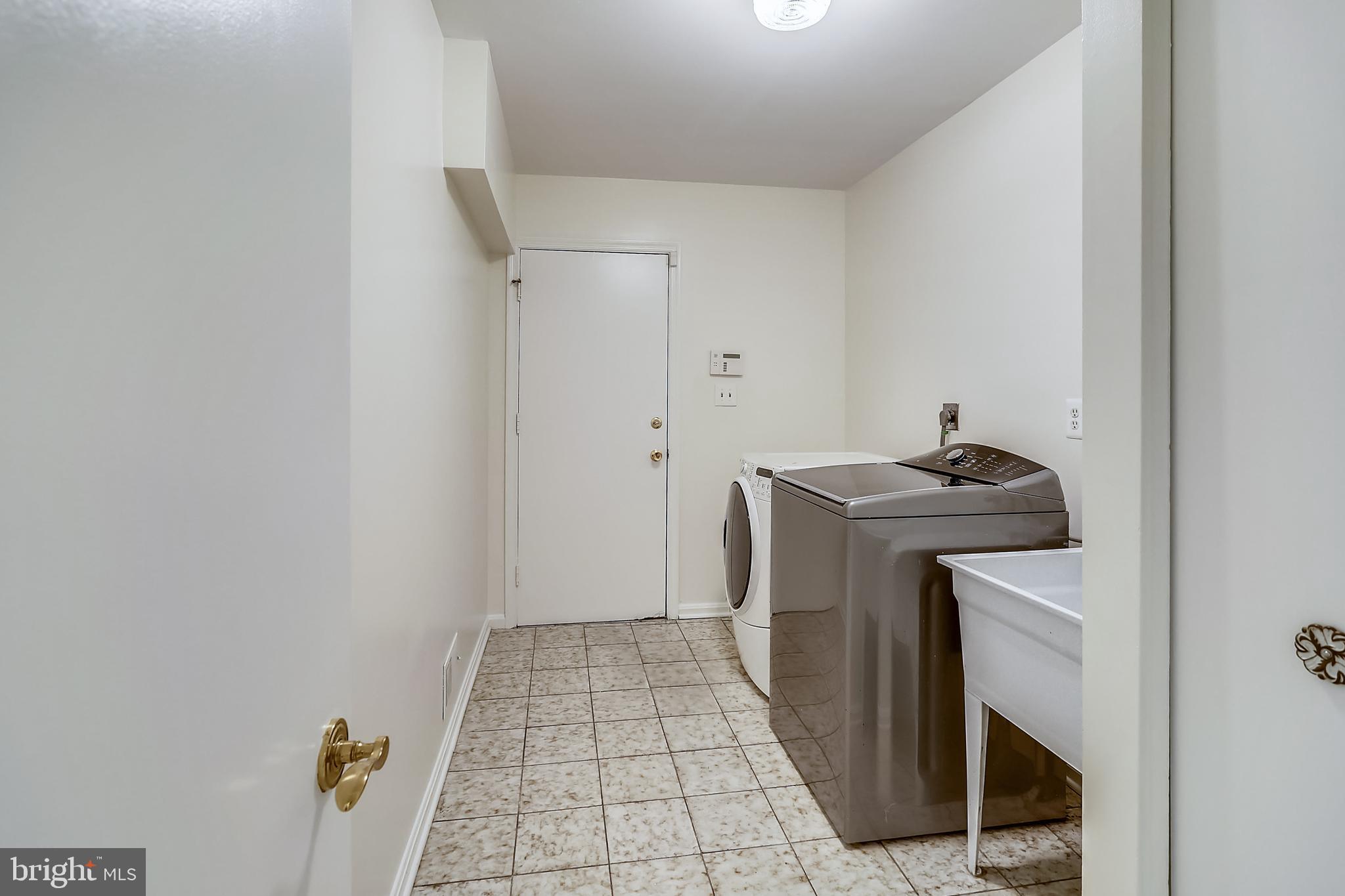 14825 Notley Road Silver Spring, MD 20905 - Photo 25 of 60 Laundry/mudroom leads to garage