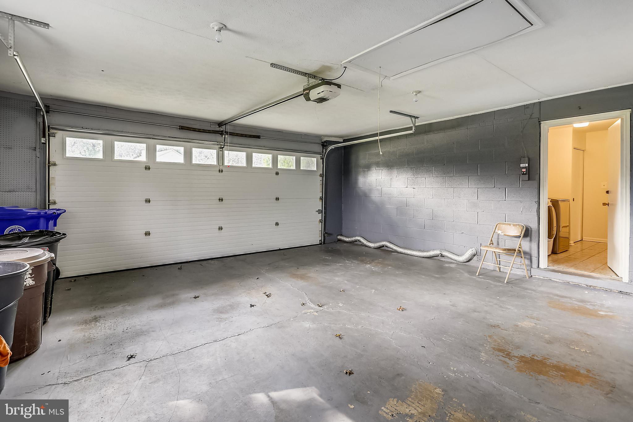 14825 Notley Road Silver Spring, MD 20905 - Photo 26 of 60 2-car garage with overhead storage