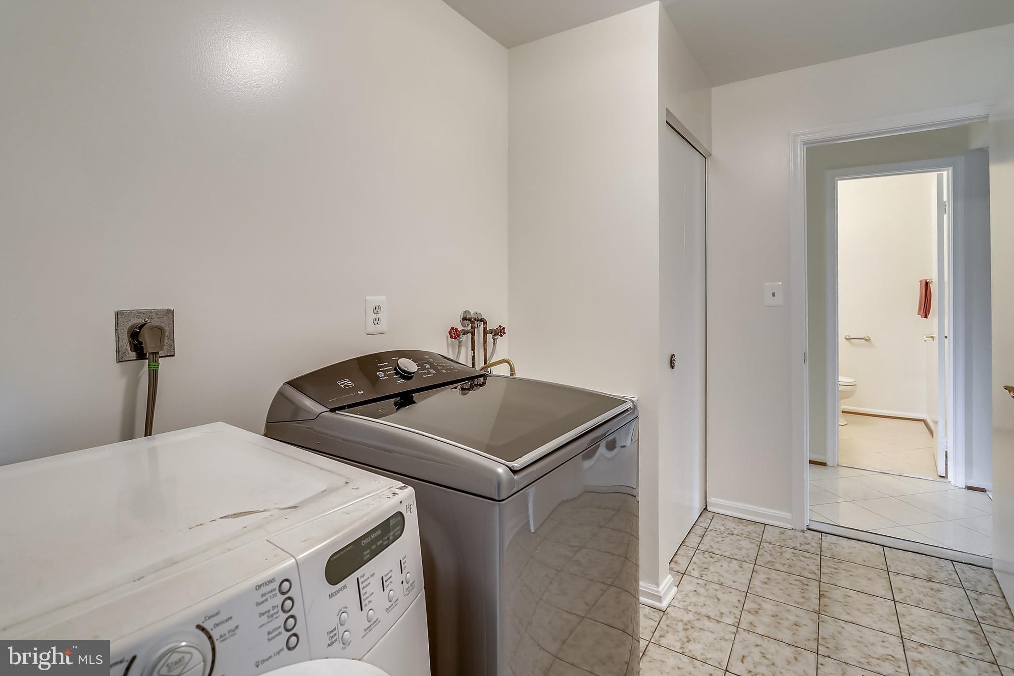 14825 Notley Road Silver Spring, MD 20905 - Photo 28 of 60 Laundry room has closet