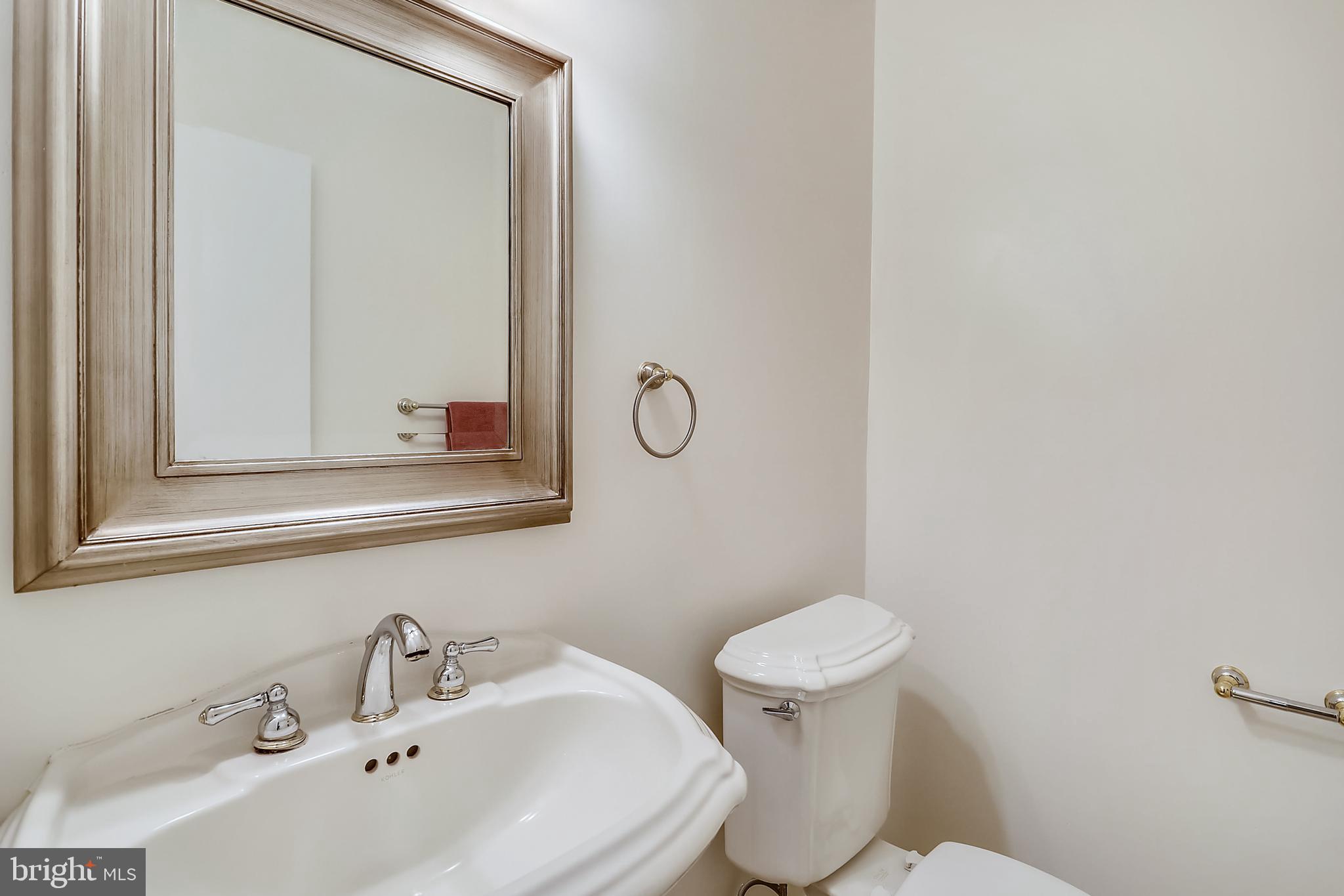 14825 Notley Road Silver Spring, MD 20905 - Photo 29 of 60 Updated powder room on entry level