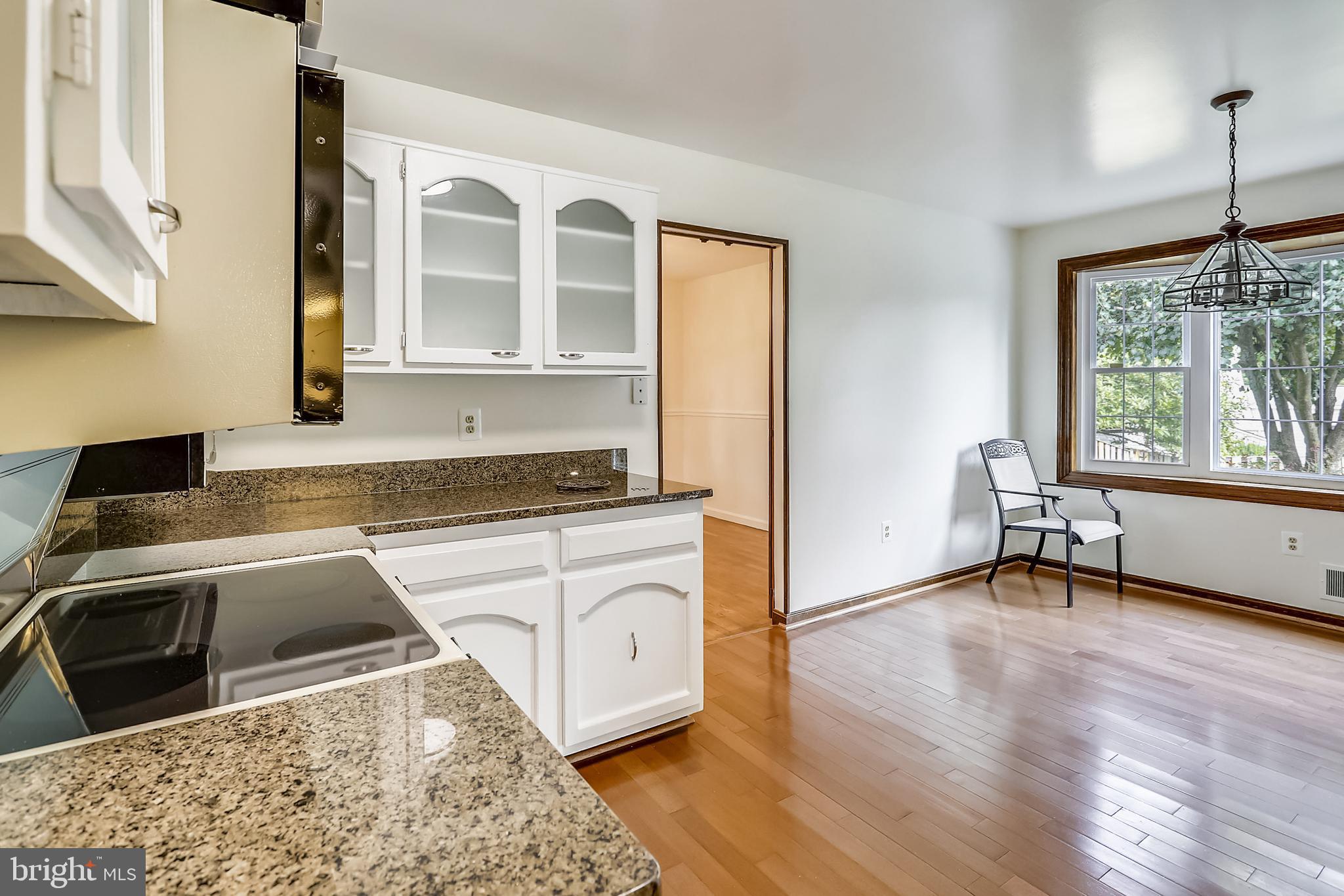 14825 Notley Road Silver Spring, MD 20905 - Photo 7 of 60 Kitchen has granite counters and a breakfast area