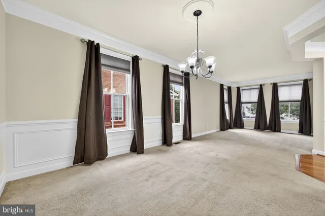 a view of a livingroom with furniture and a fireplace