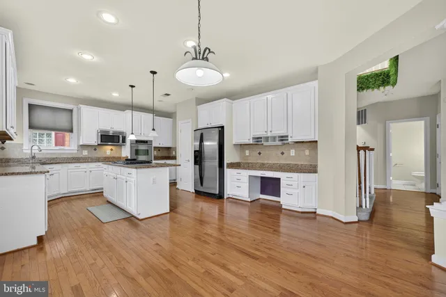a bathroom with a toilet sink and a bathtub