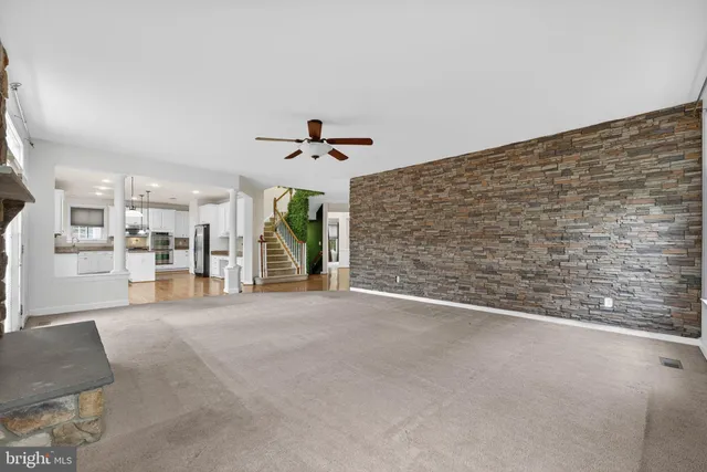 a view of outdoor space with wooden floor and trees