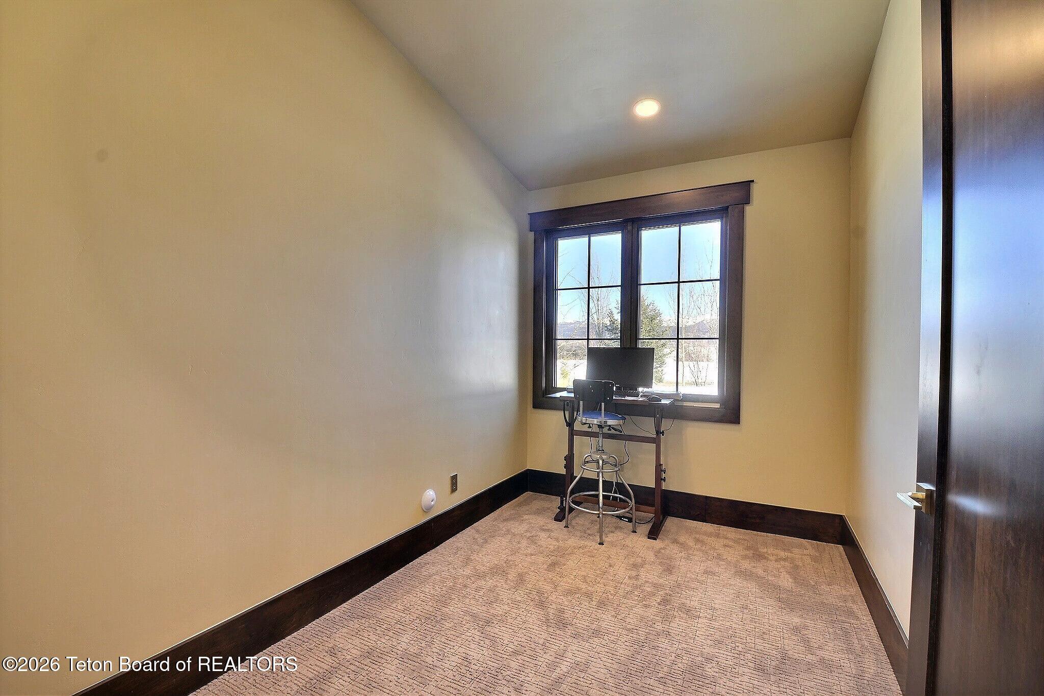 9802 Hiddenwaters Lane Victor, ID 83455 - Photo 14 of 52 Sitting area off Main Bedroom