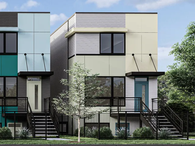 a front view of a building with a garden