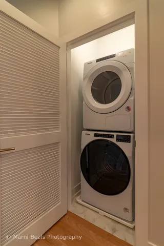 a utility room with washer and dryer