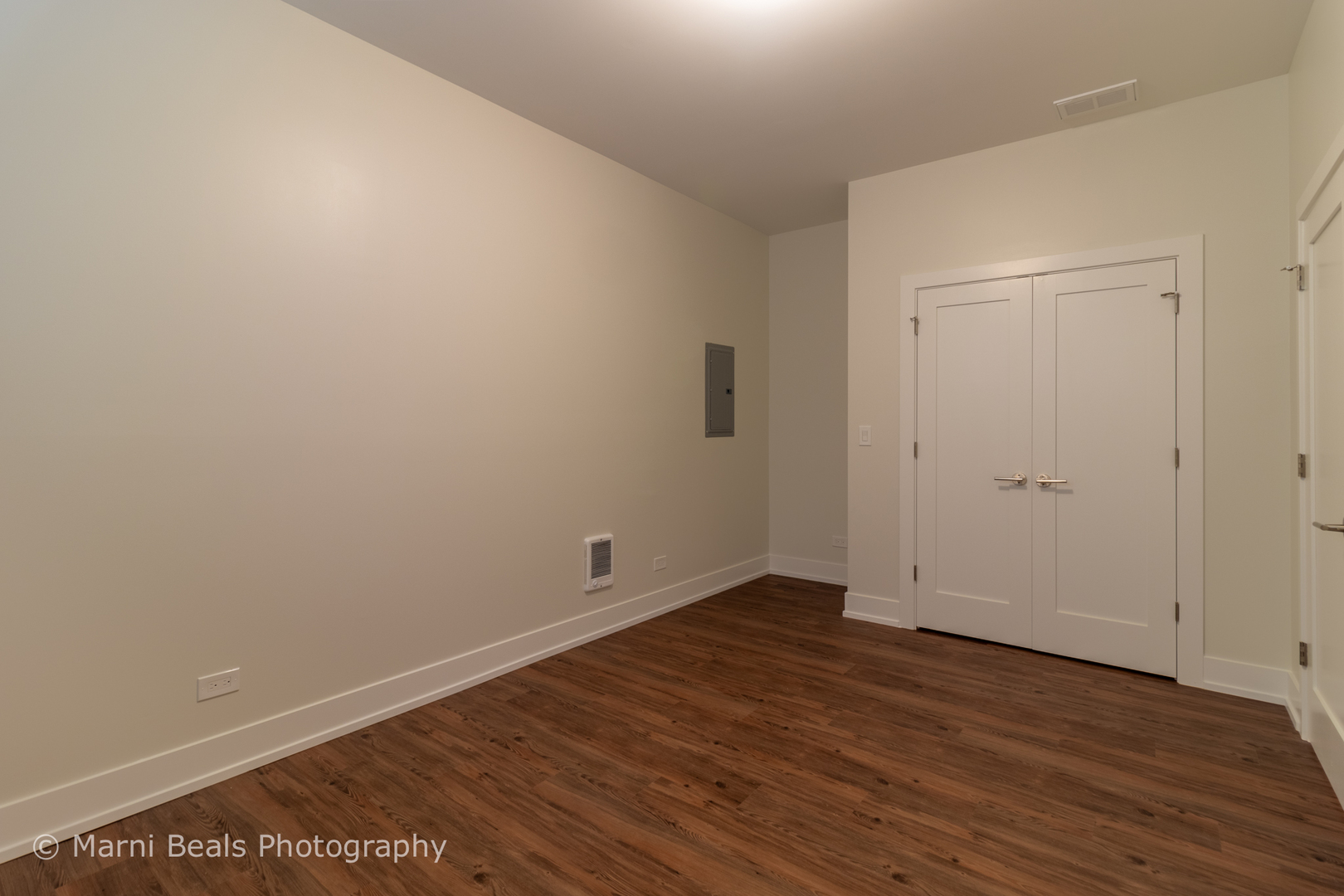 12 West 44th Street Chicago, IL 60632 - Photo 25 of 29 a view of an empty room with wooden floor
