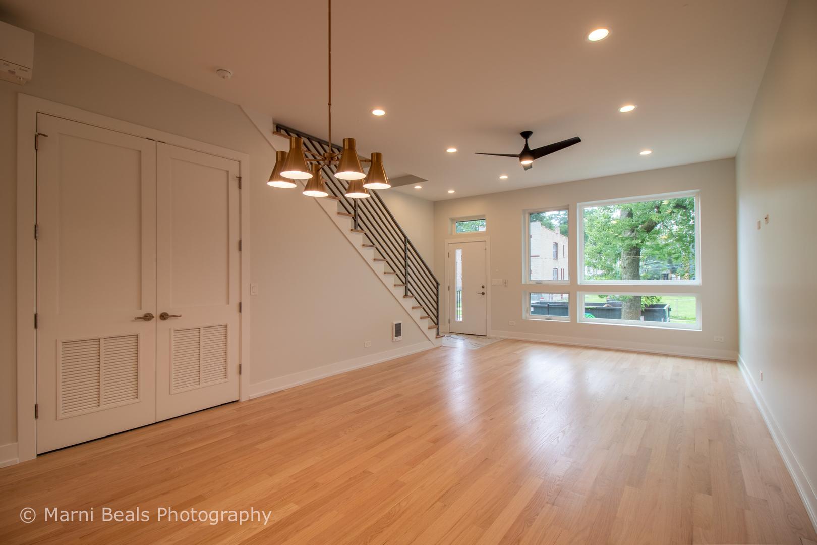 12 West 44th Street Chicago, IL 60632 - Photo 7 of 29 a view of a livingroom with a ceiling fan and window