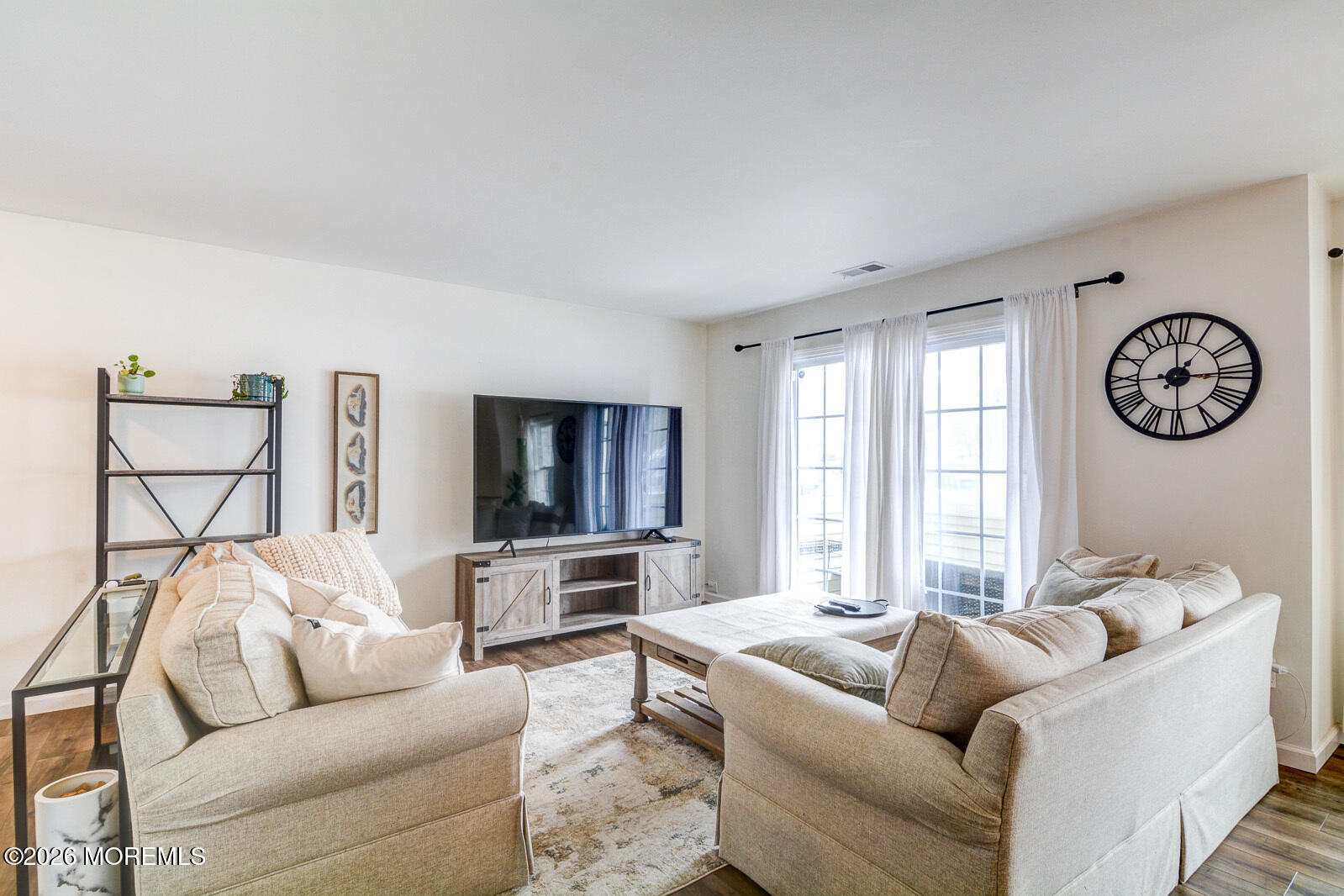 1 White Oak Court Howell, NJ 07731 - Photo 5 of 13 a living room with furniture and a large window